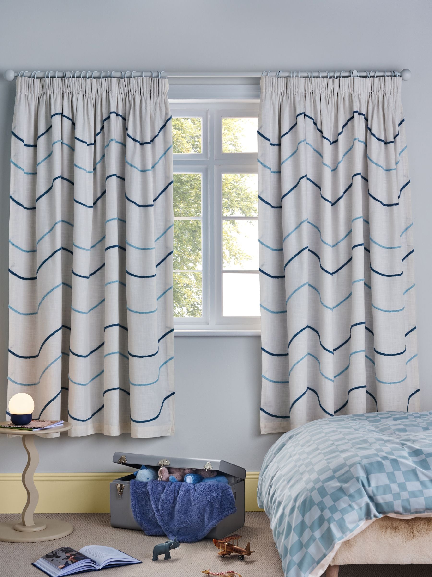 Blue tufted wiggle pencil pleat blackout curtains, imported from the UK