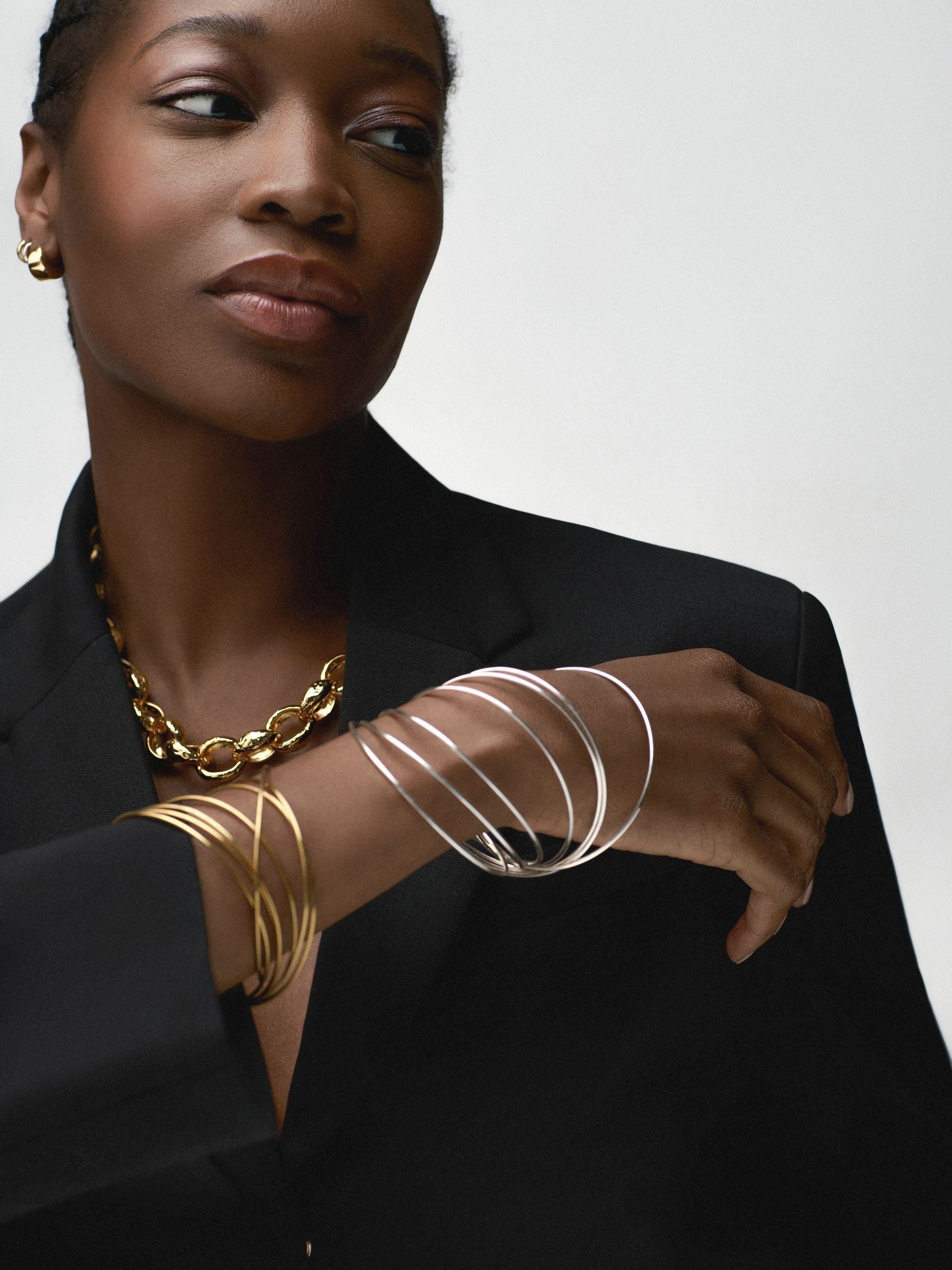 Orelia Gullfarget Multi Sammenlåsende Armbånd Smykker, importert fra Storbritannia