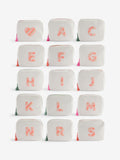 White alphabet makeup bag in soft faux leather - British product
