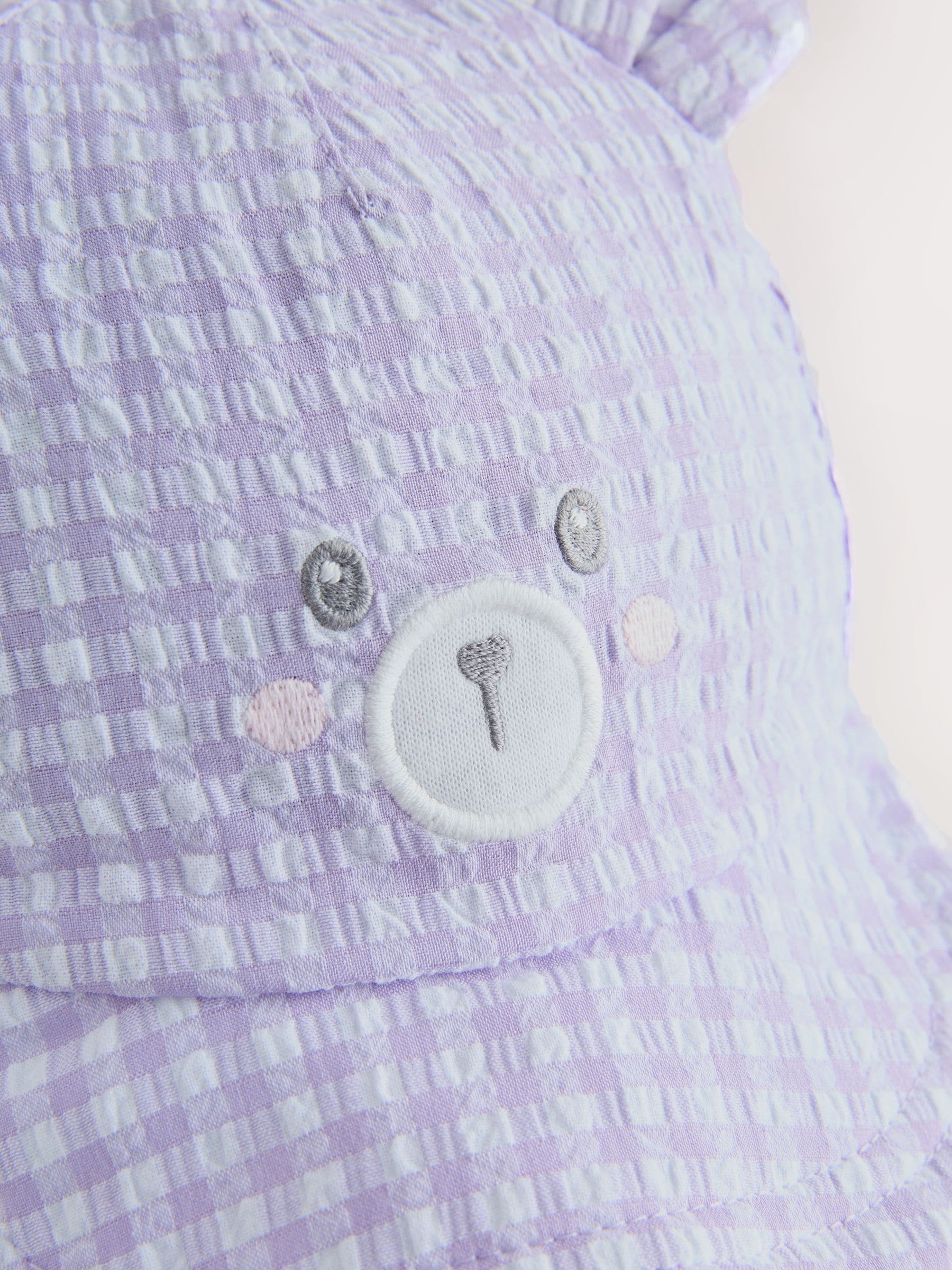 Purple gingham legionnaire baby hat with embroidered bear, imported from the UK