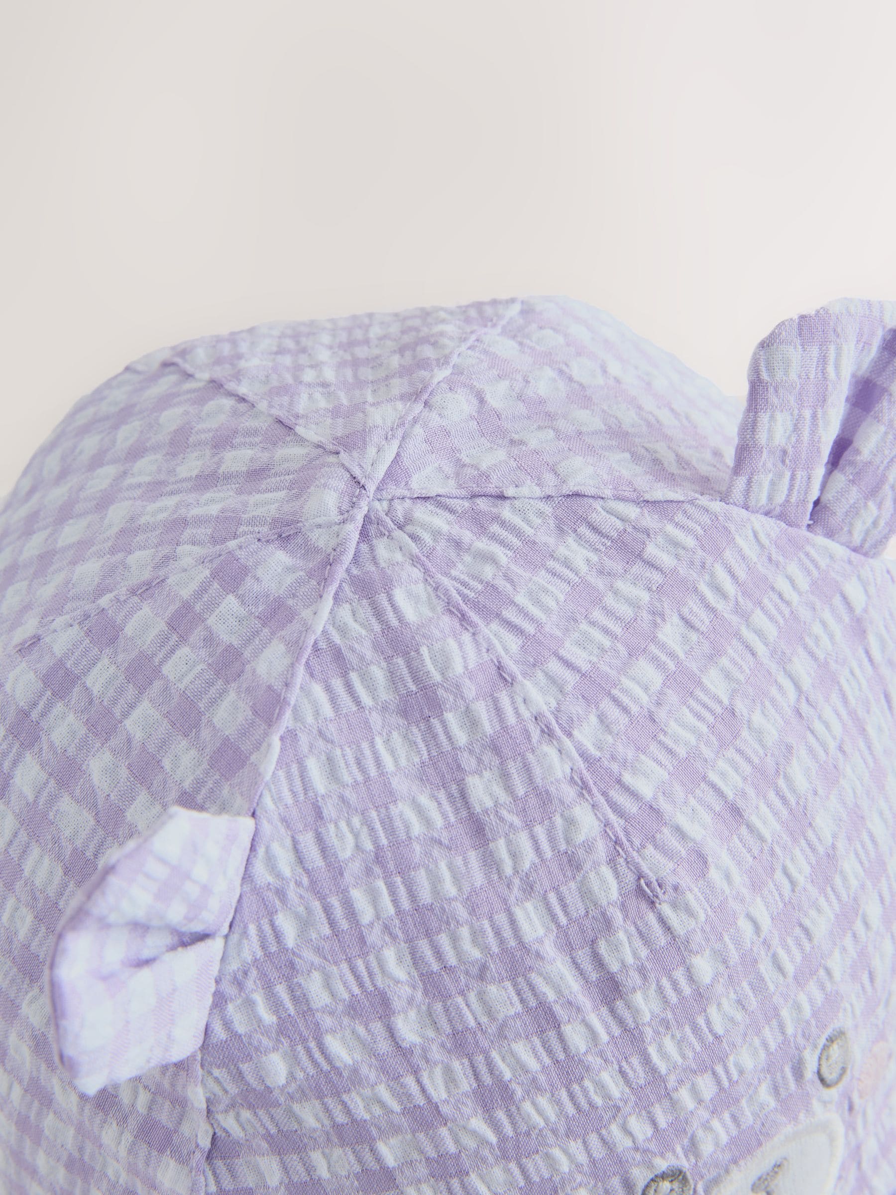 Purple gingham legionnaire baby hat with embroidered bear, imported from the UK