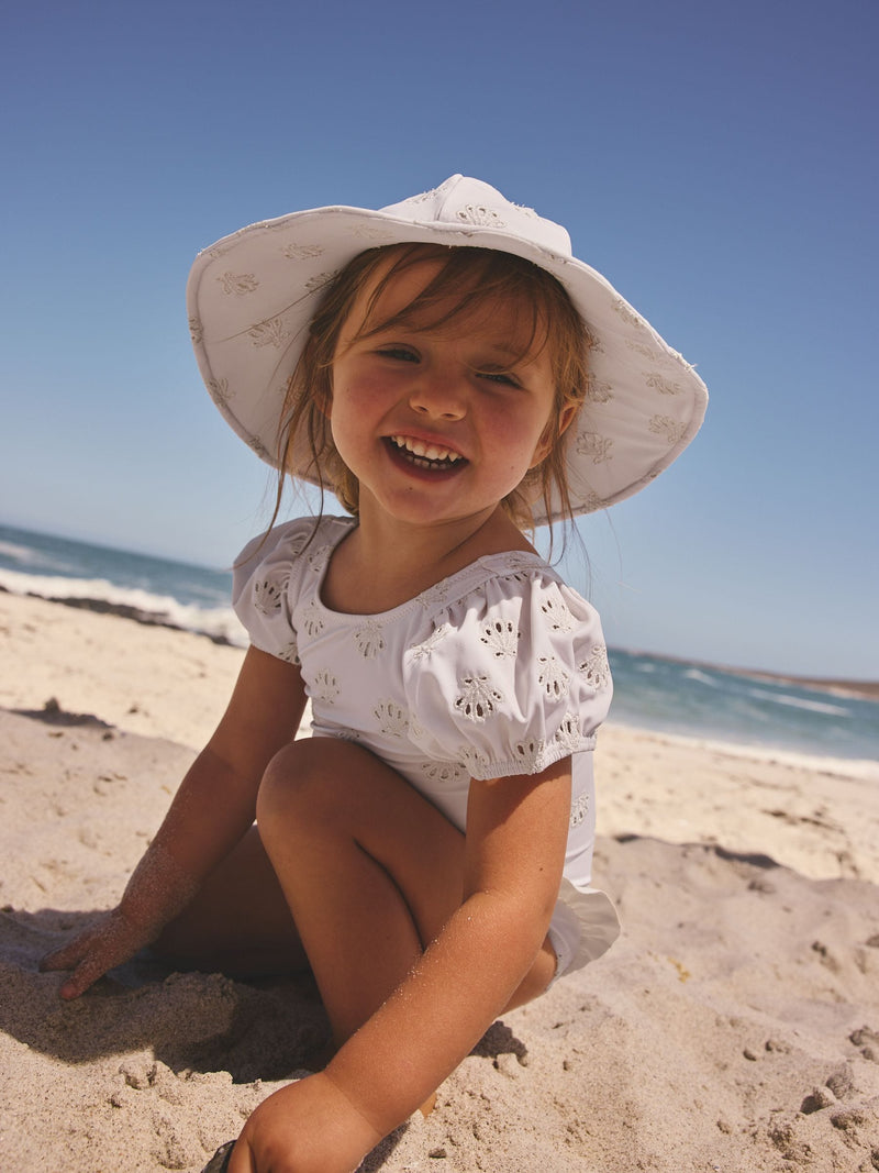 White embroidered swim hat sizes 3mths-10yrs, imported from the UK