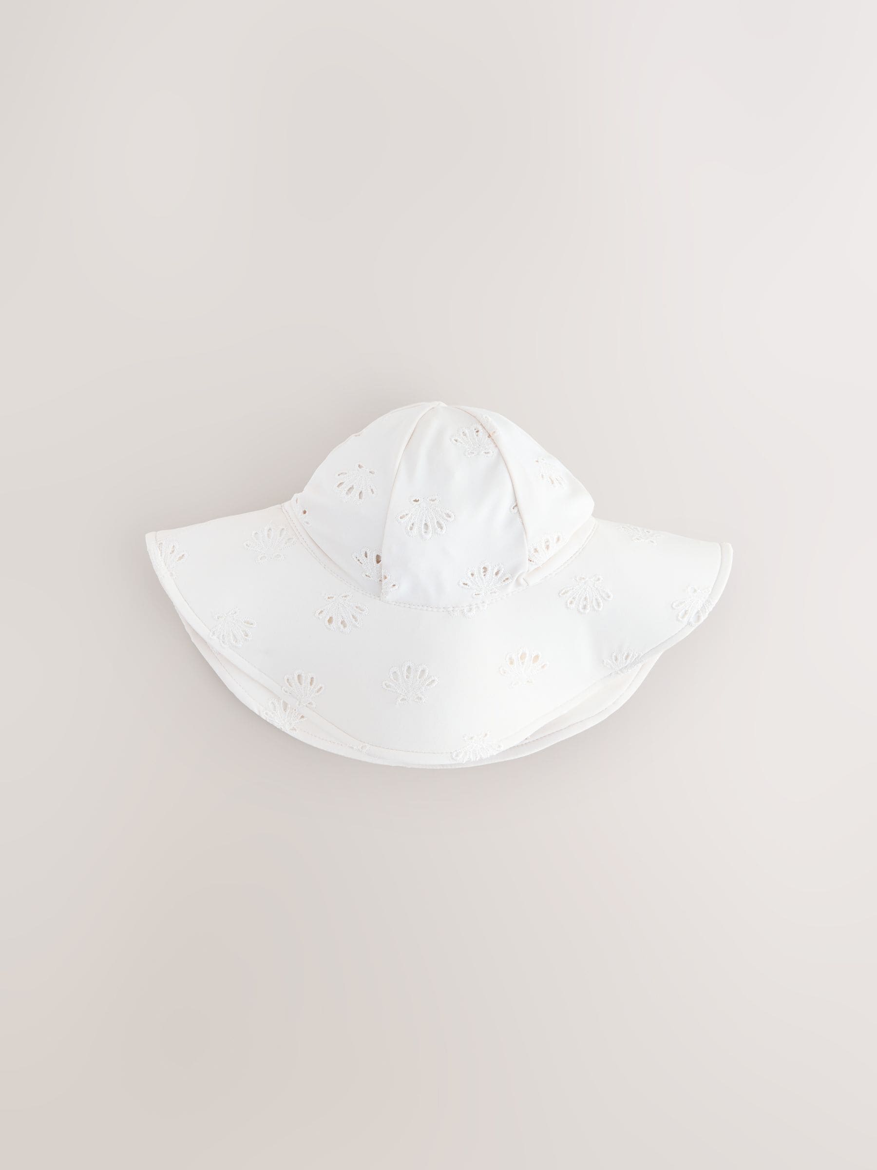 White embroidered swim hat sizes 3mths-10yrs, imported from the UK