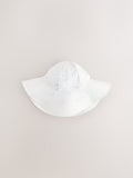 White embroidered swim hat sizes 3mths-10yrs, imported from the UK
