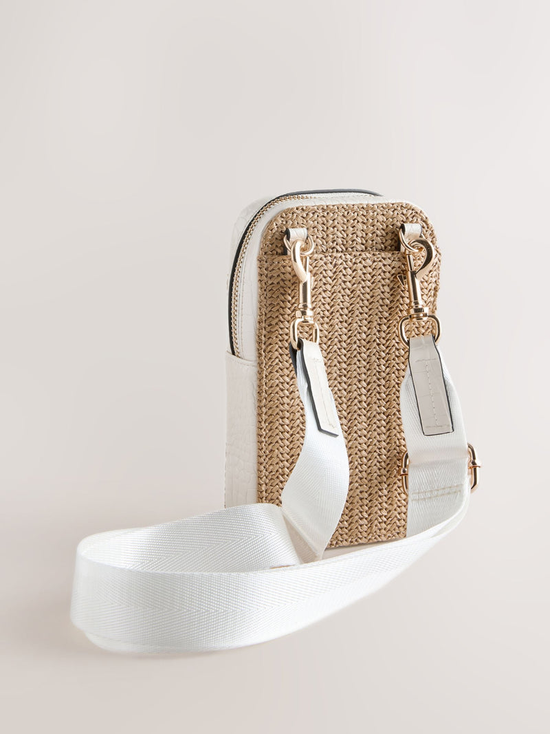 Raffia-effect phone bag with zip closure and adjustable strap, UK version