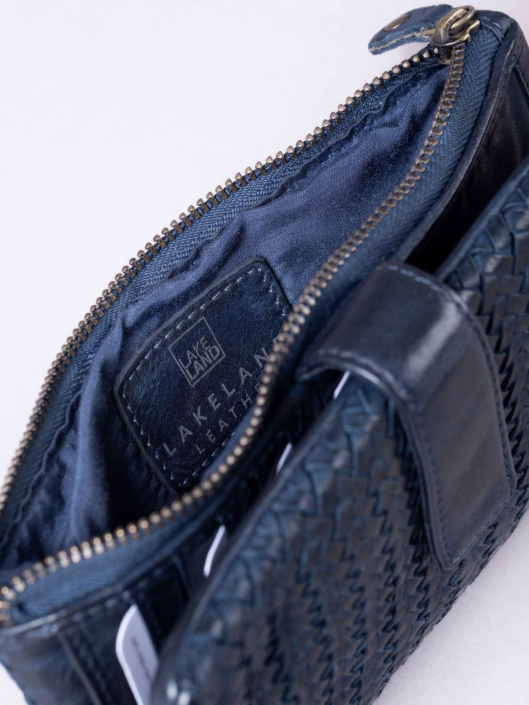 Lakeland Leather blue large Wreay tab purse, imported from the UK