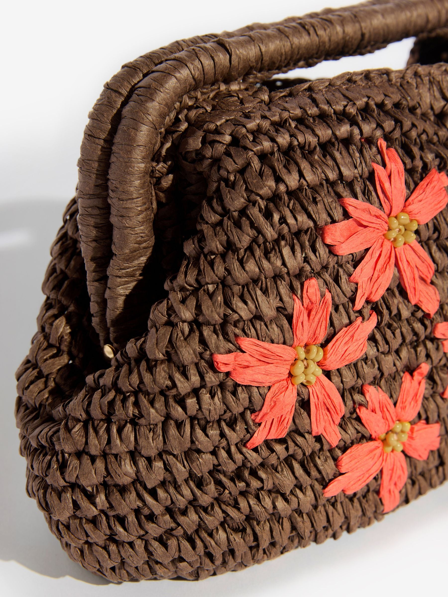 Love & Roses chocolate brown floral raffia top handle clutch bag - British product
