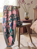 Pink floral fleece throw made from recycled polyester, imported from the UK