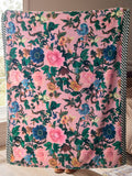 Pink floral fleece throw made from recycled polyester, imported from the UK