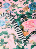 Pink floral fleece throw made from recycled polyester, imported from the UK
