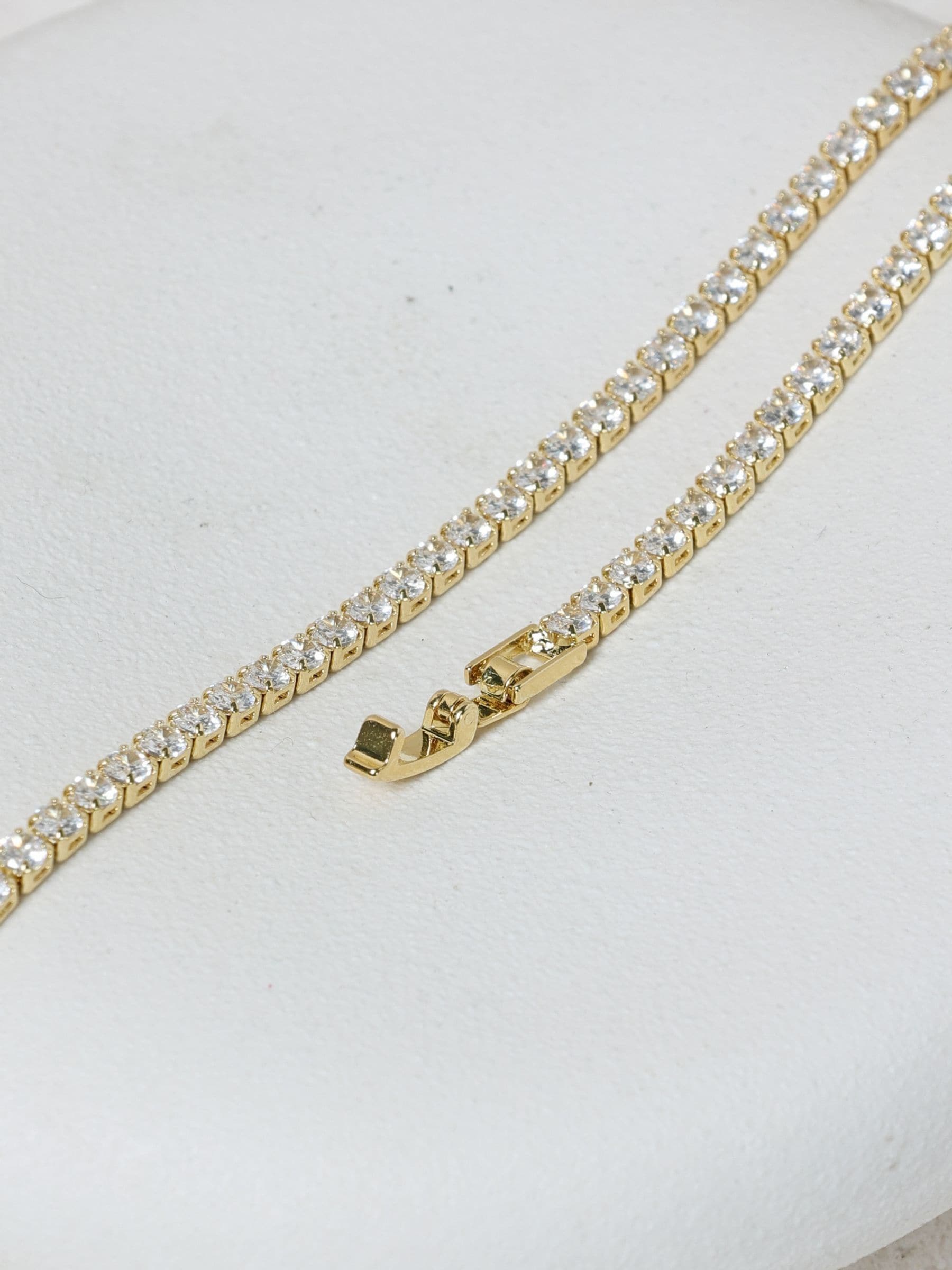 Jon Richard gold tone cubic zirconia round tennis bracelet, UK version