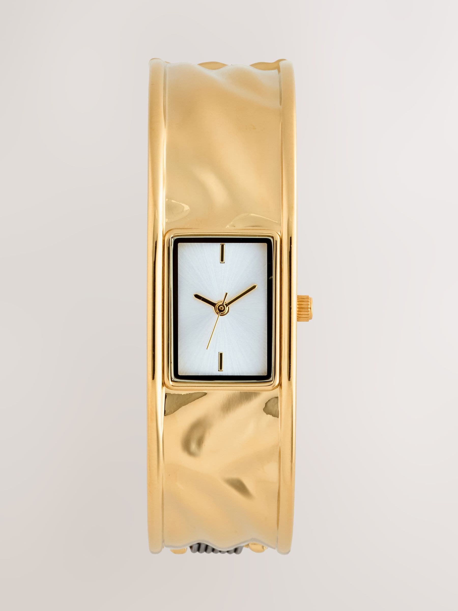 Gold tone hinged bangle watch cuff bracelet (British brand)