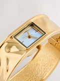Gold tone hinged bangle watch cuff bracelet (British brand)