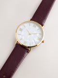 Burgundy red round case leather strap watch, UK version