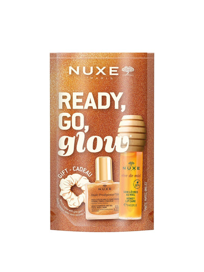 Next Nuxe Glow On The Go Pack Honey Lip Oil Beauty Travel Set- Kjøp online hos McGrocer