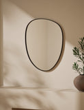 Pebble metal curved wall mirror, imported from the UK