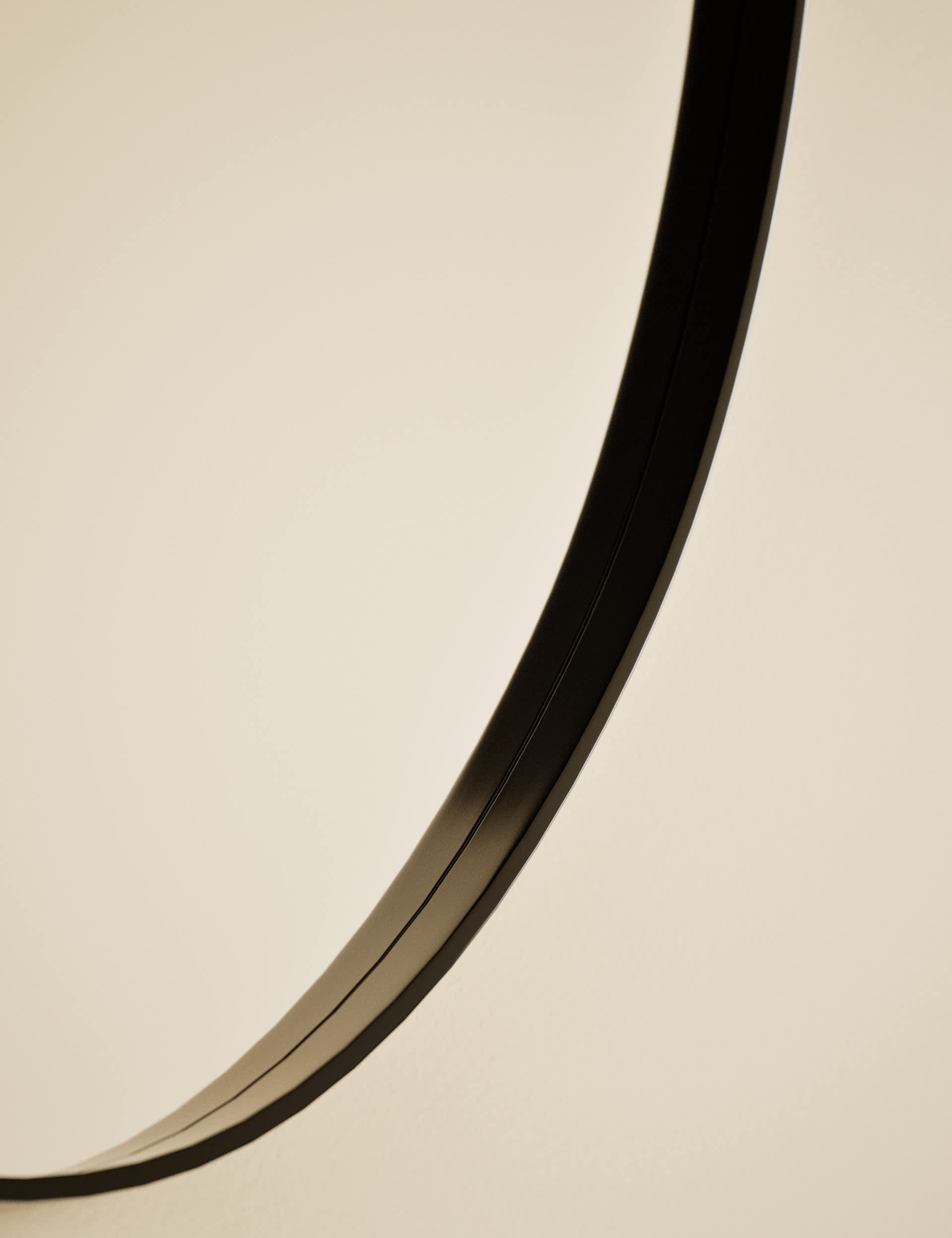 Pebble metal curved wall mirror, imported from the UK