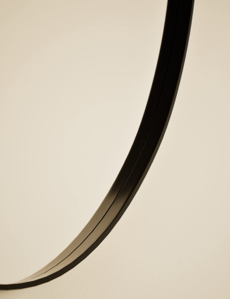 Pebble metal curved wall mirror, imported from the UK