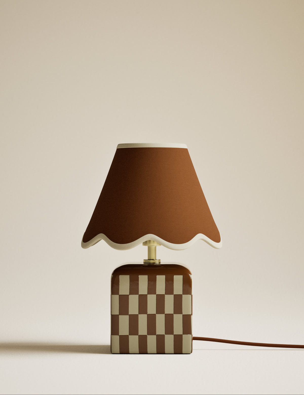 Checkerboard ceramic table lamp with scalloped shade, imported from the UK