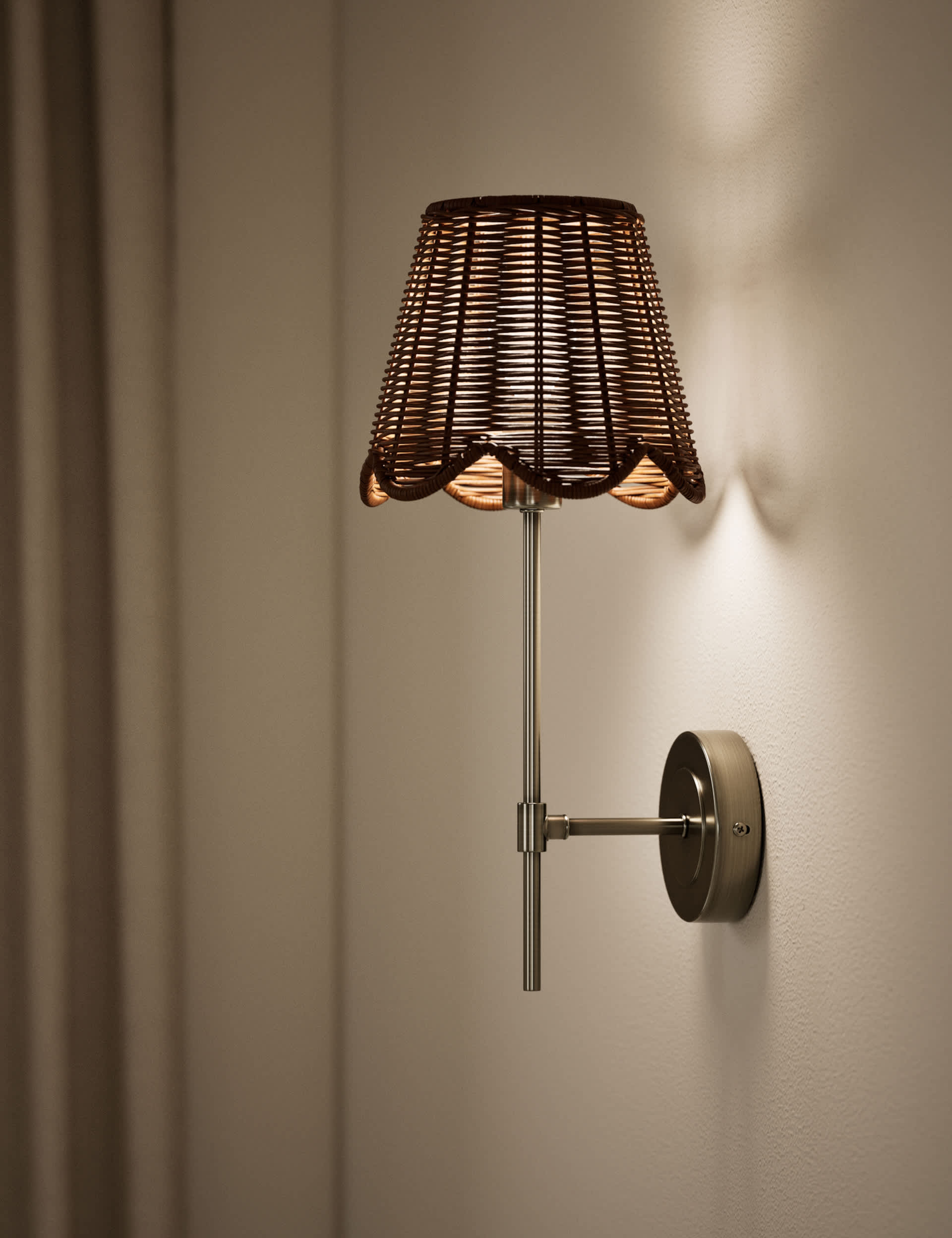 Wicker scalloped wall light with antique brass finish, UK version