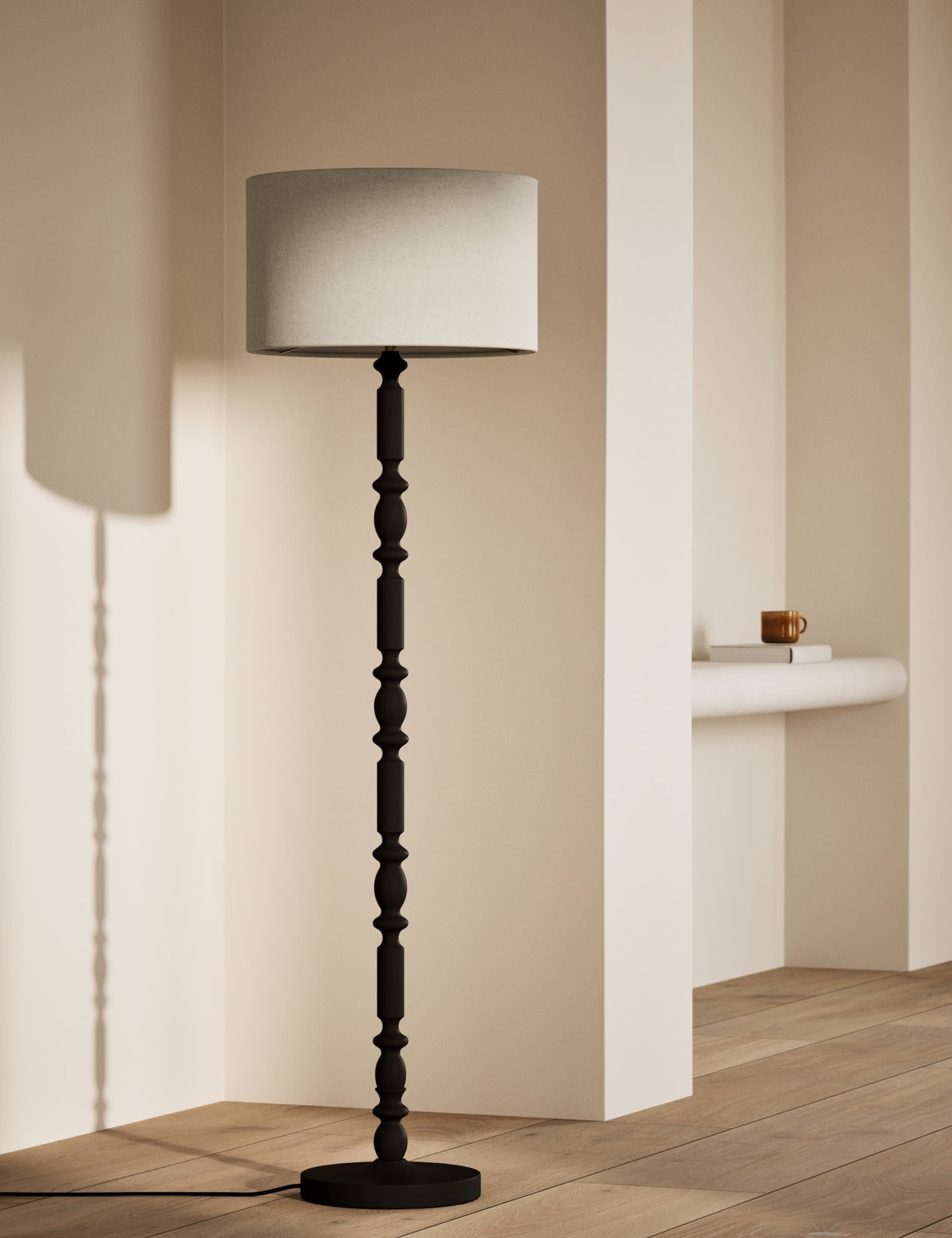 Bobbin floor lamp with wooden detailing and cylinder shade, imported from the UK
