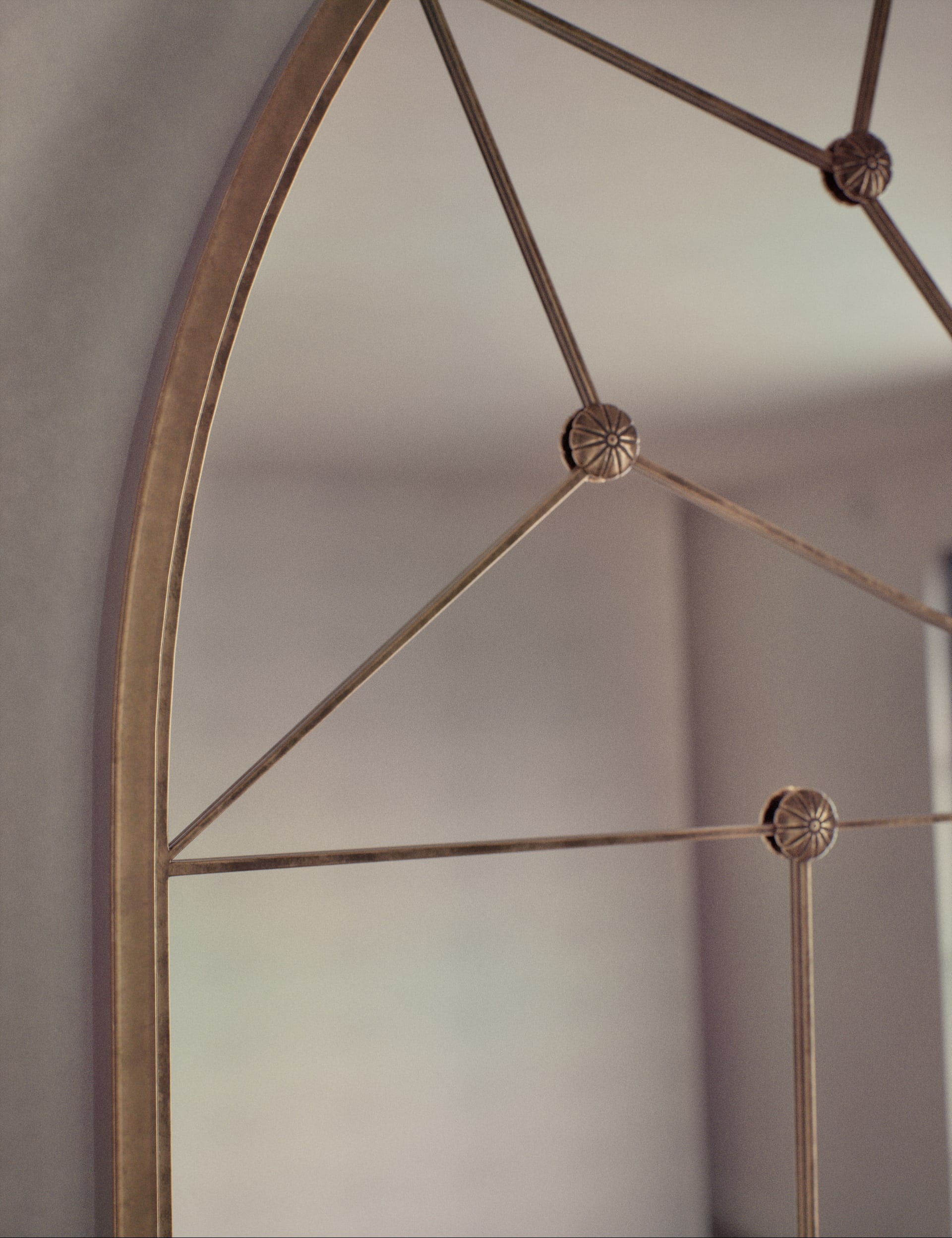 Metal arch wall mirror medium size from a British brand
