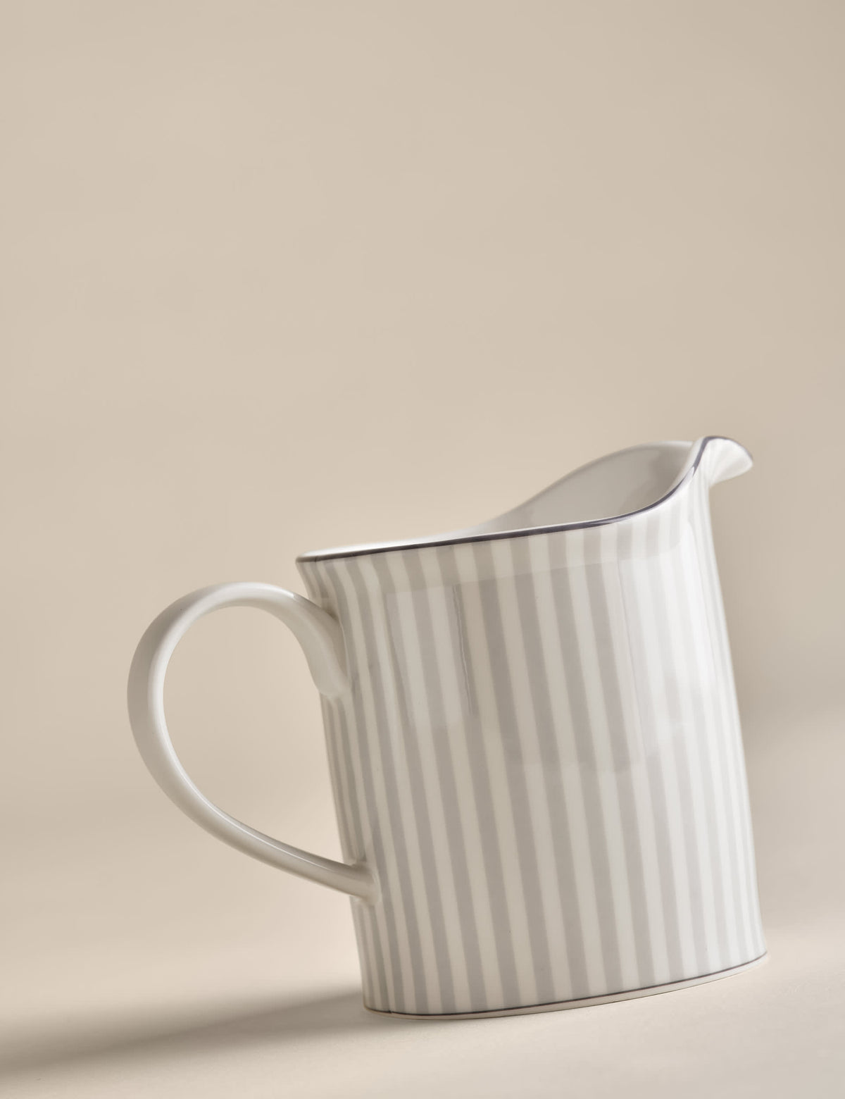 Hampton milk jug with gold-tone trim on china, UK version