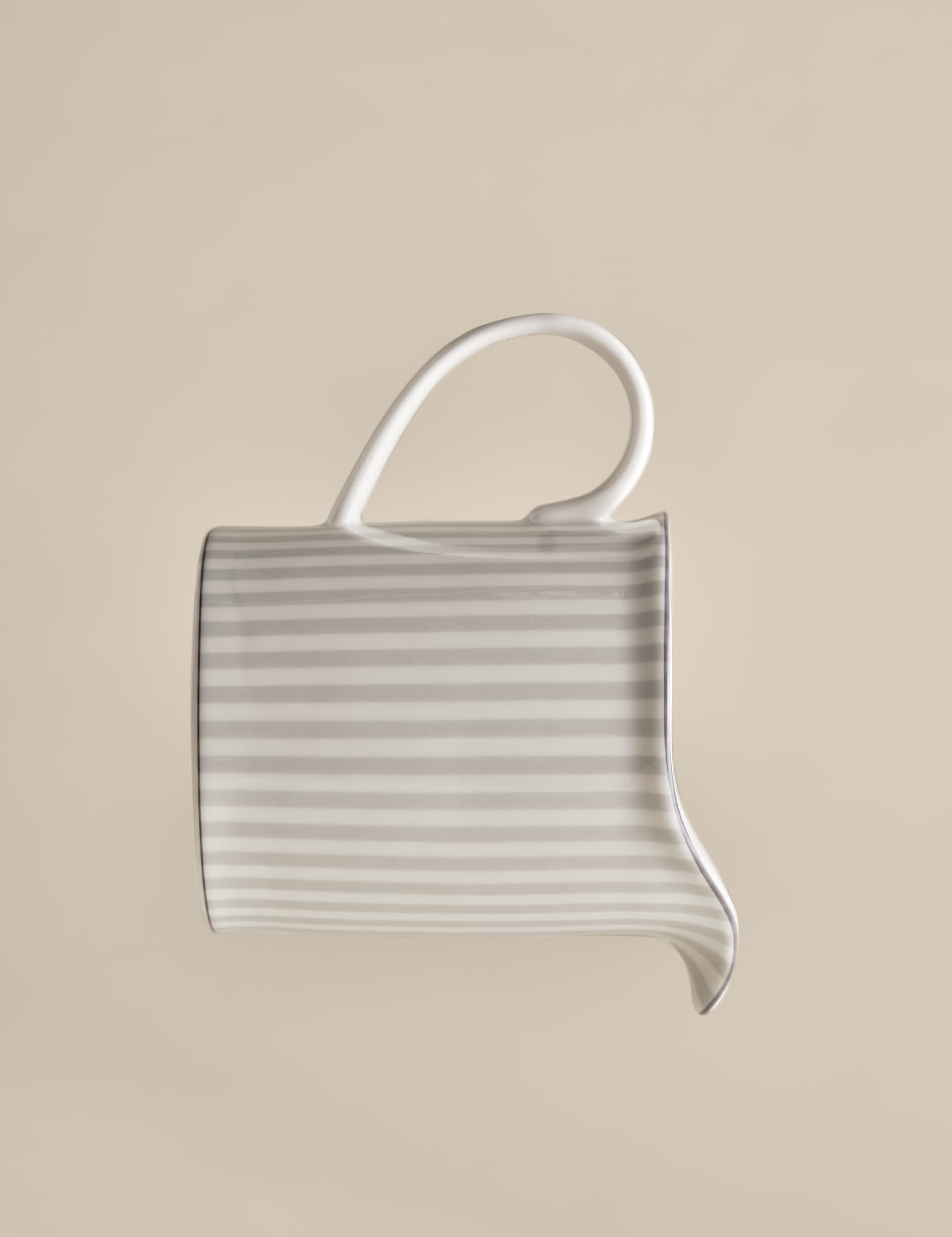 Hampton milk jug with gold-tone trim on china, UK version