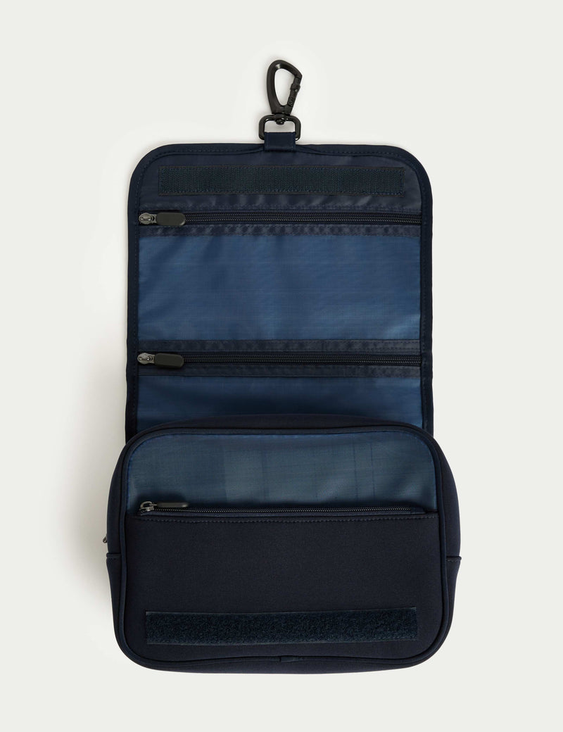 Hanging toiletry bag with mesh pockets and hook, imported from the UK