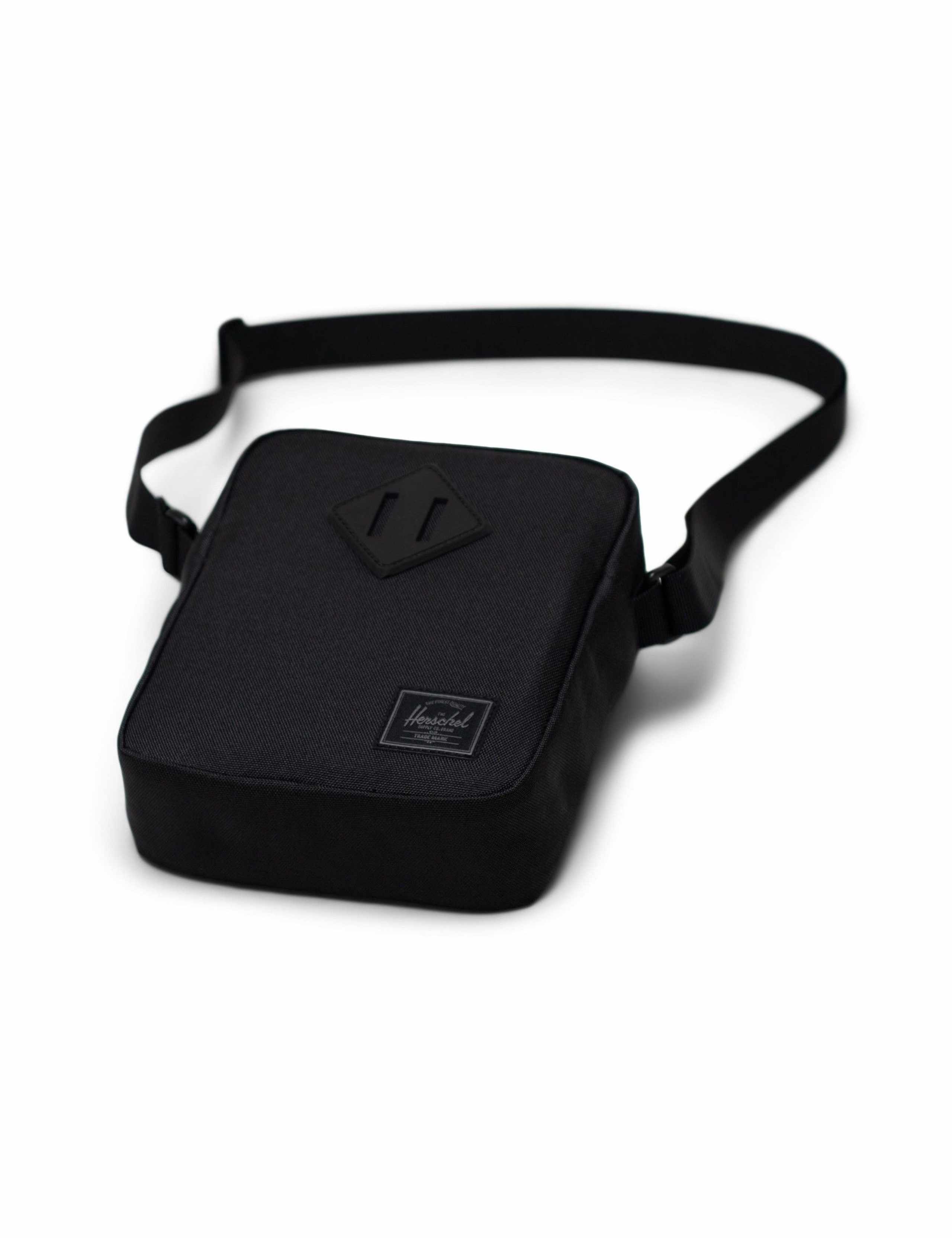 Herschel Heritage crossbody bag with adjustable strap, imported from the UK