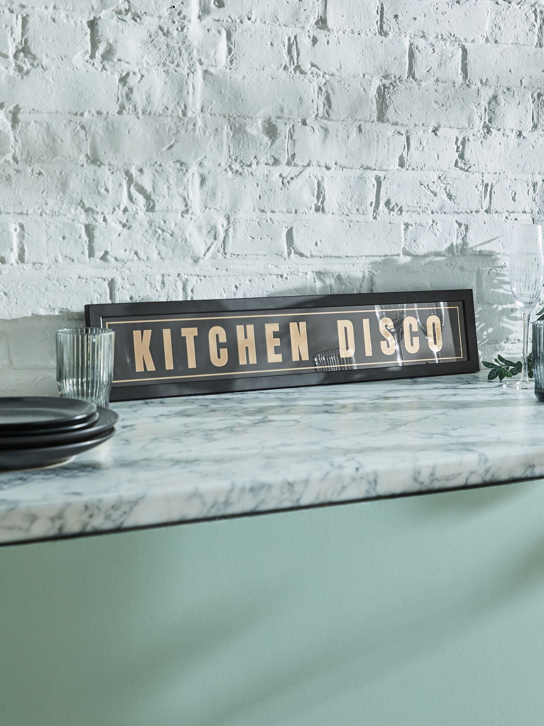 Black and gold Kitchen Disco framed wall art, 14x71cm - British product