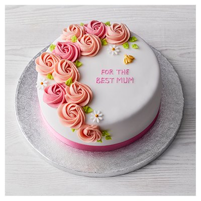 Rose cake with buttercream rosettes and bee decoration (British brand)