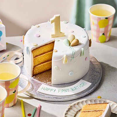 Waitrose first birthday cake with pastel balloons and number 1 (British brand)