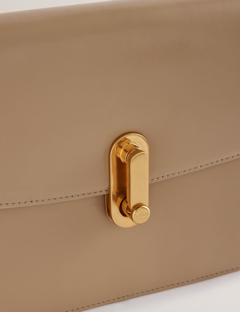 Ted Baker leather cross body bag with gold hardware, imported from the UK