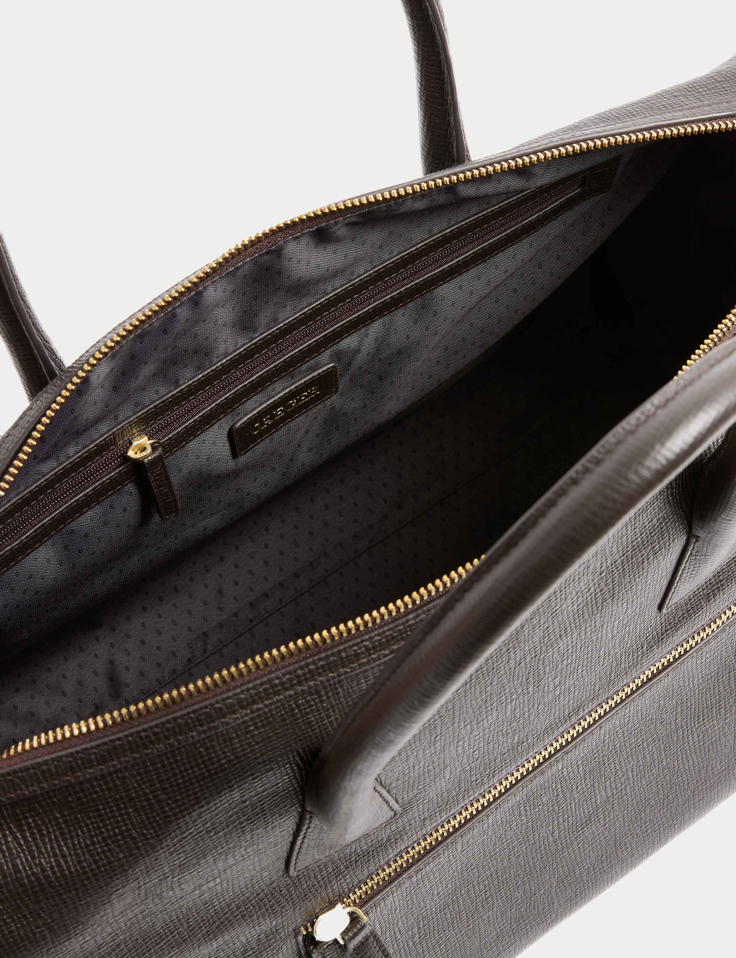 Soft Leather Holdall with Vintage Detailing and Adjustable Strap