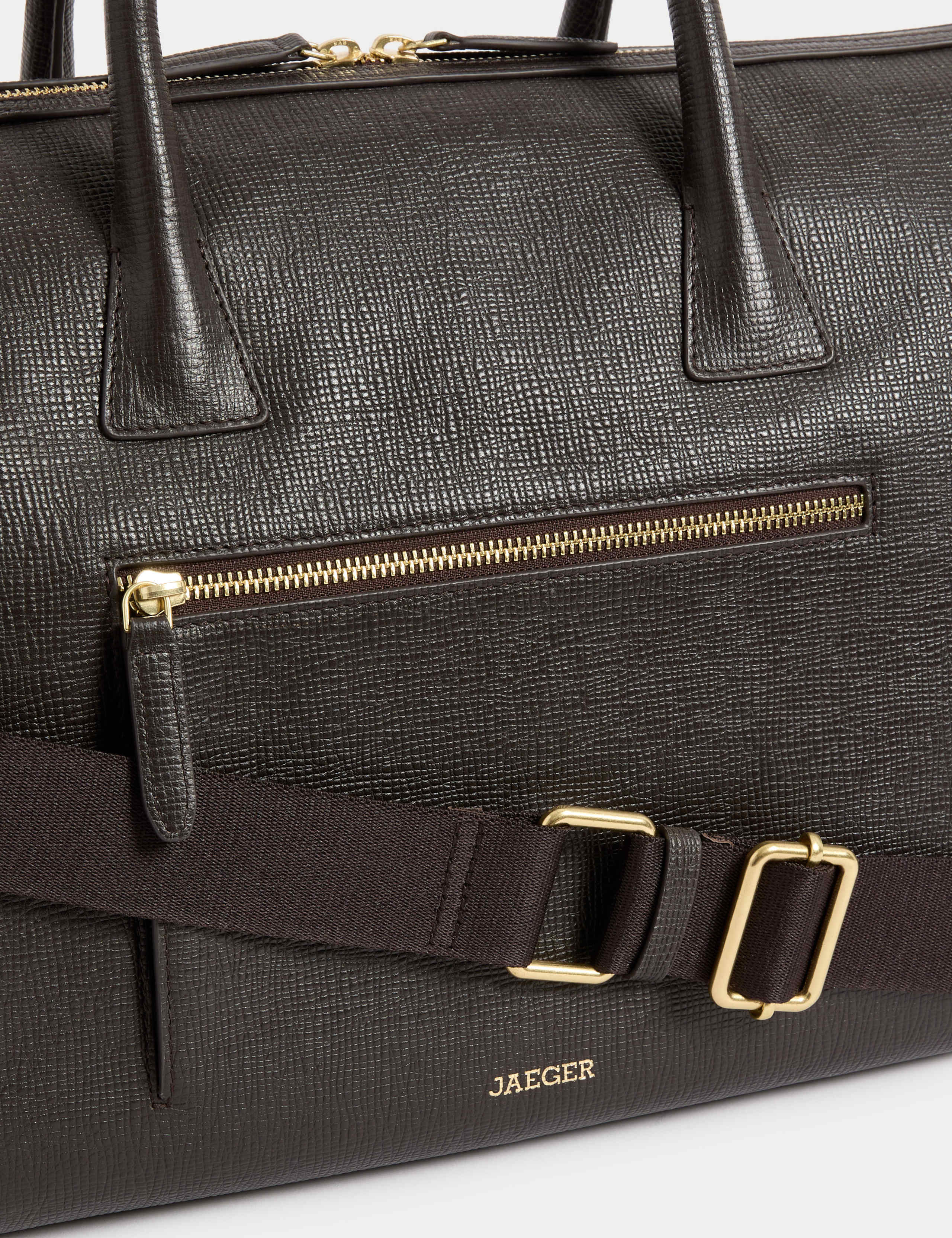 Soft Leather Holdall with Vintage Detailing and Adjustable Strap