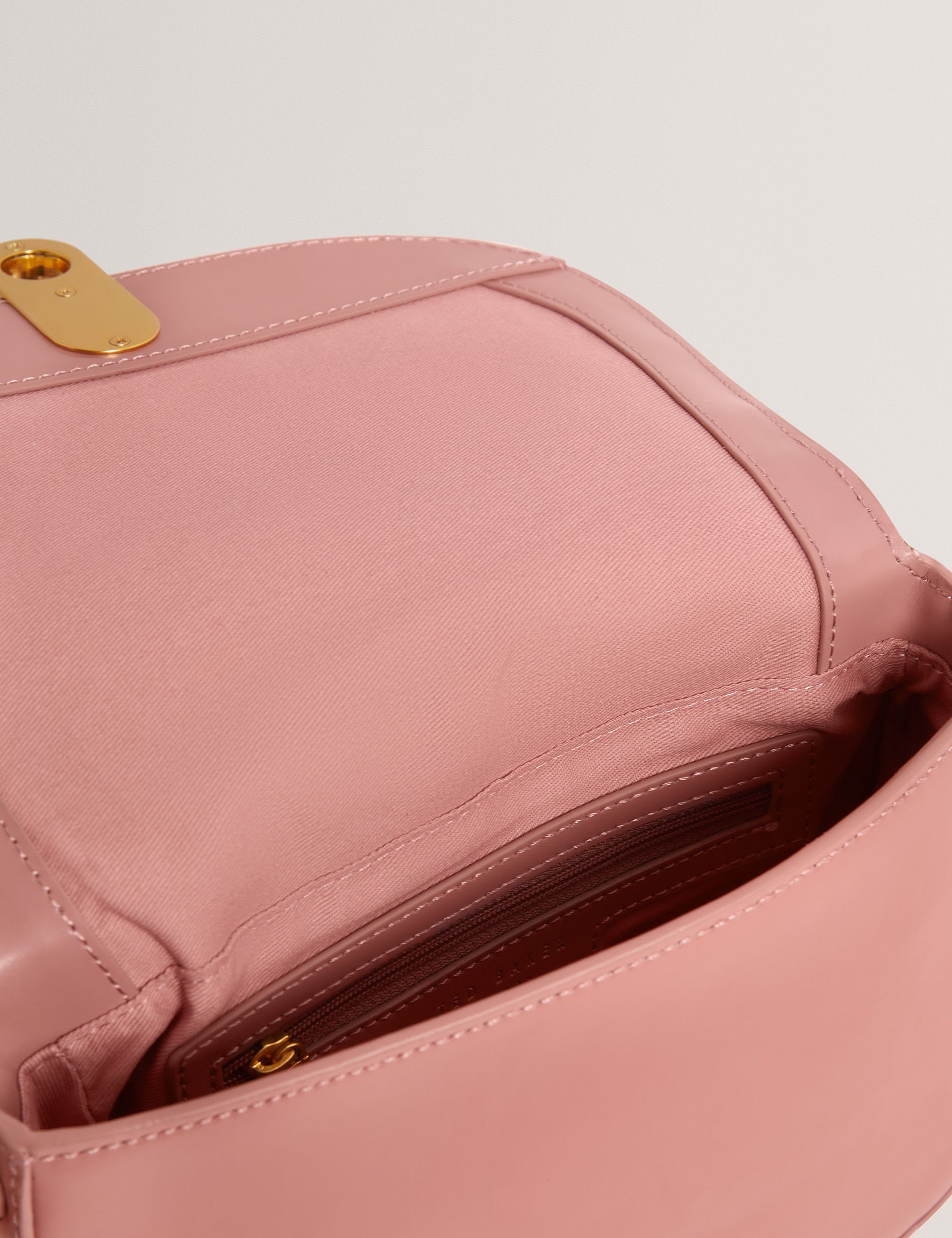 Ted Baker leather shoulder bag twist lock detail, UK version