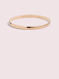 Kate Spade rose gold tone idiom bangle, UK version