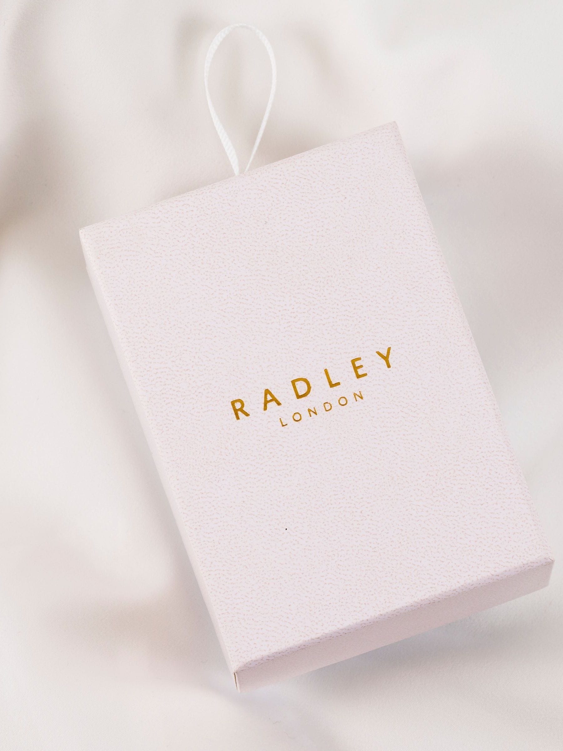 Radley Cobweb Pink Ladies Silicone Strap Floral Dog Dial Watch, imported from the UK
