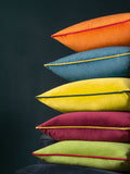 Furn orange velvet cushion with piped trim (British brand)