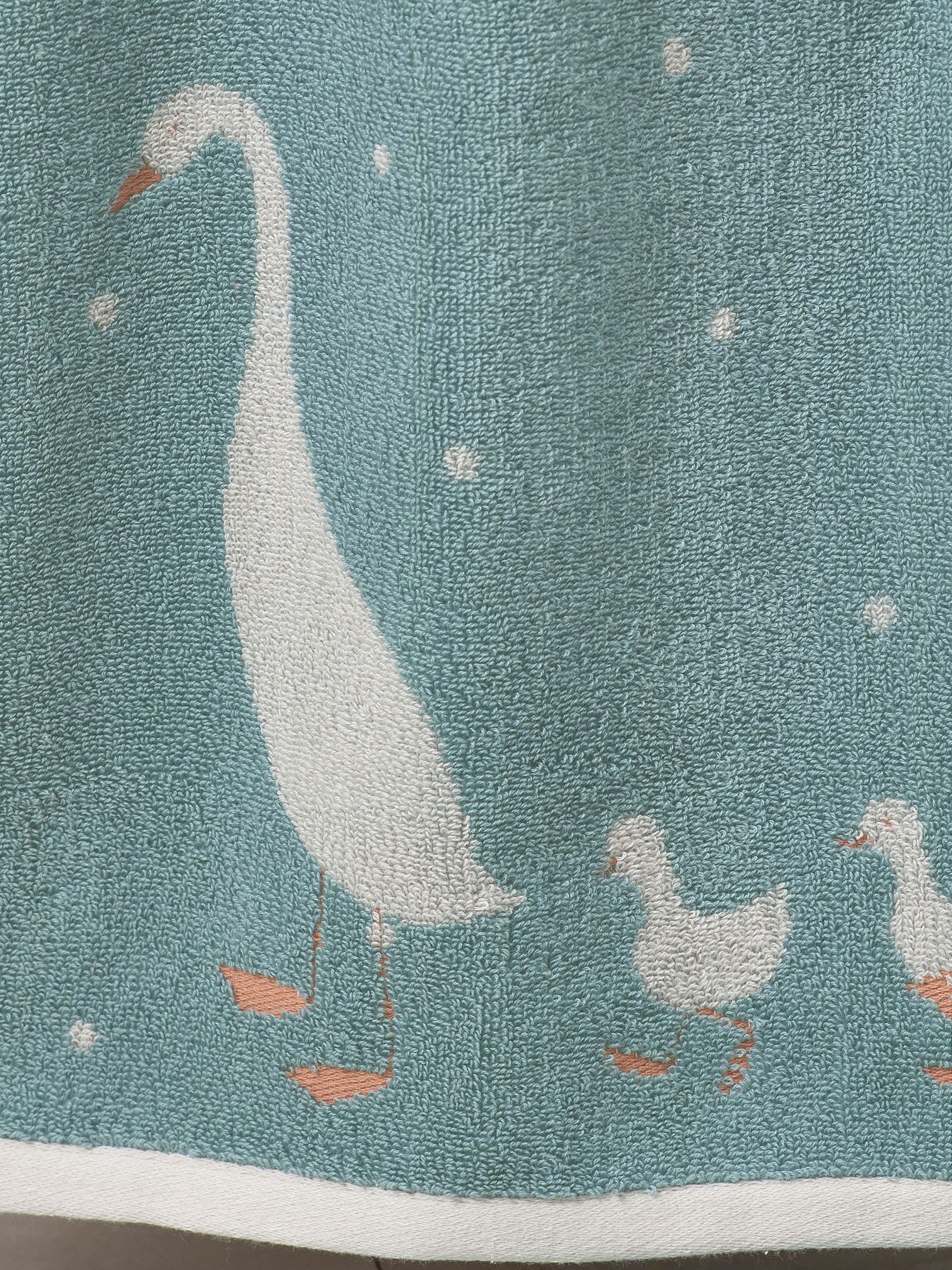 Teal blue cotton towel with geese design, UK version
