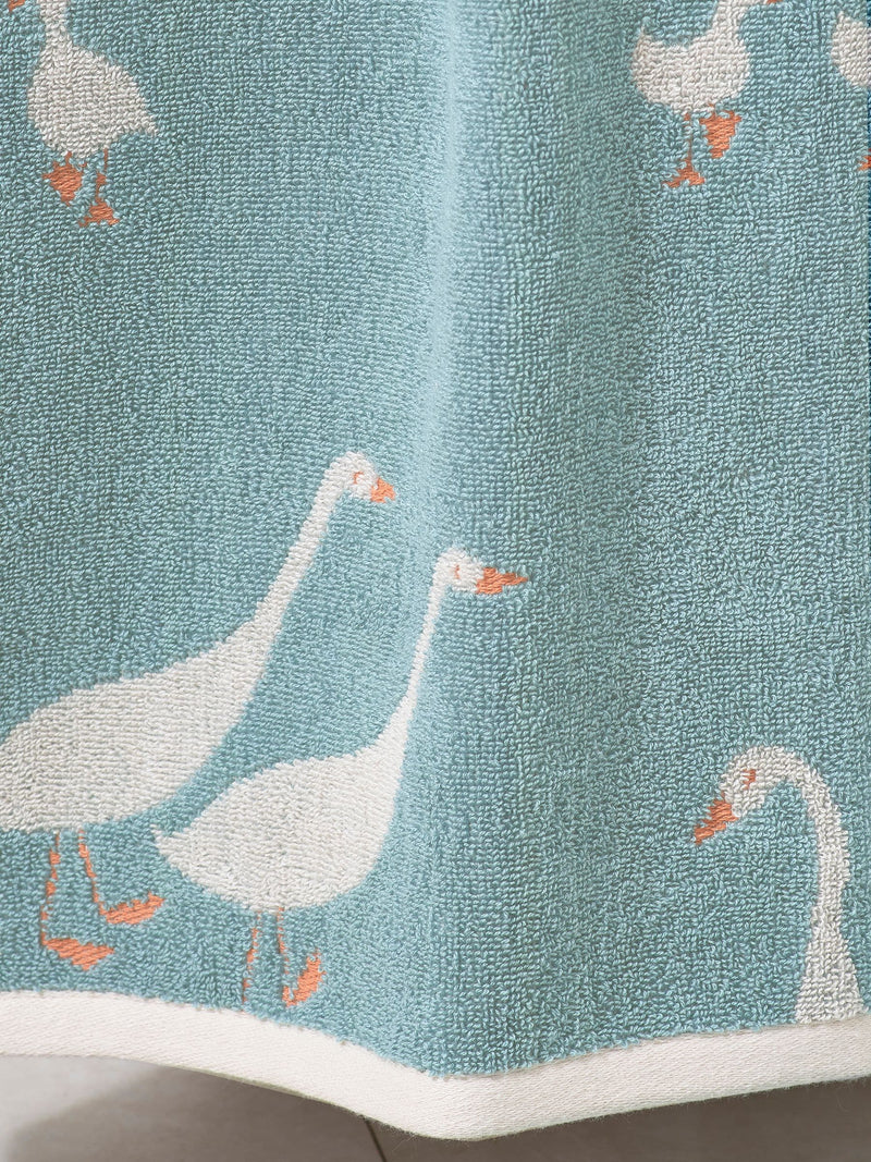 Teal blue cotton towel with geese design, UK version