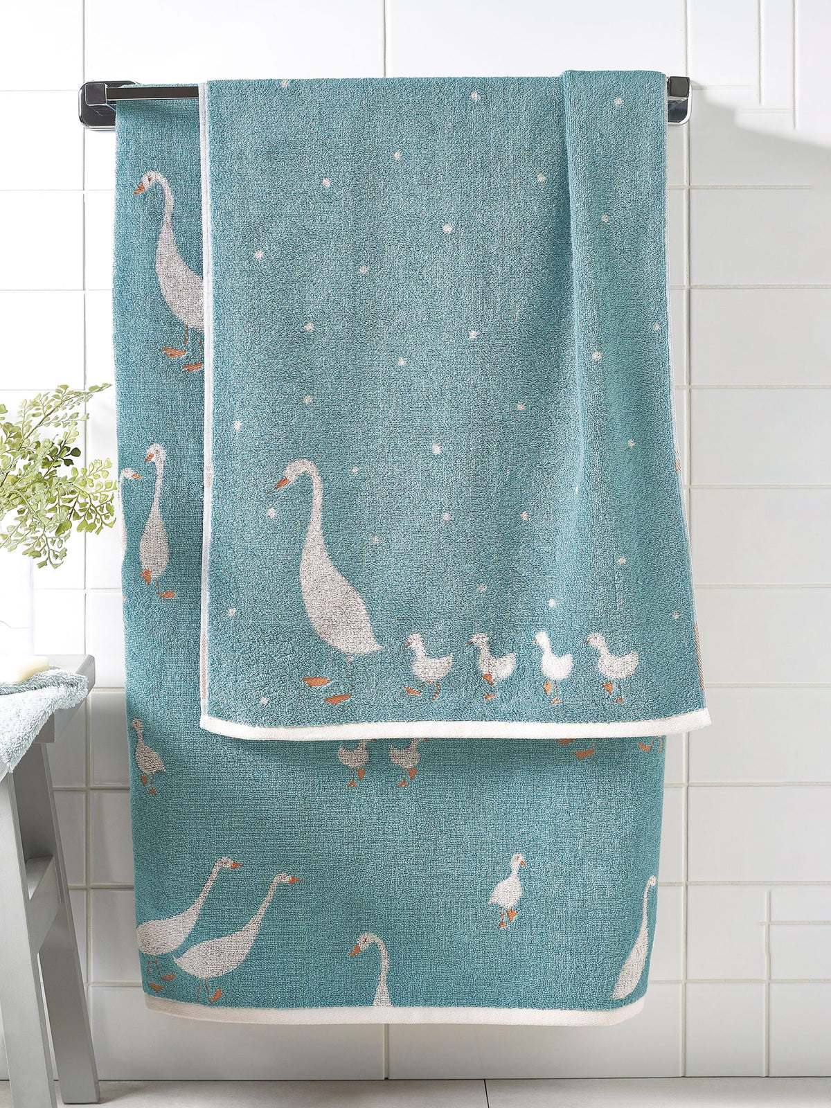 Teal blue cotton towel with geese design, UK version