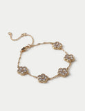Zirkonia blomsterarmbånd med metallinnfatning (britisk merke)