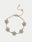 Cubic zirconia flower bracelet with metal setting (British brand)