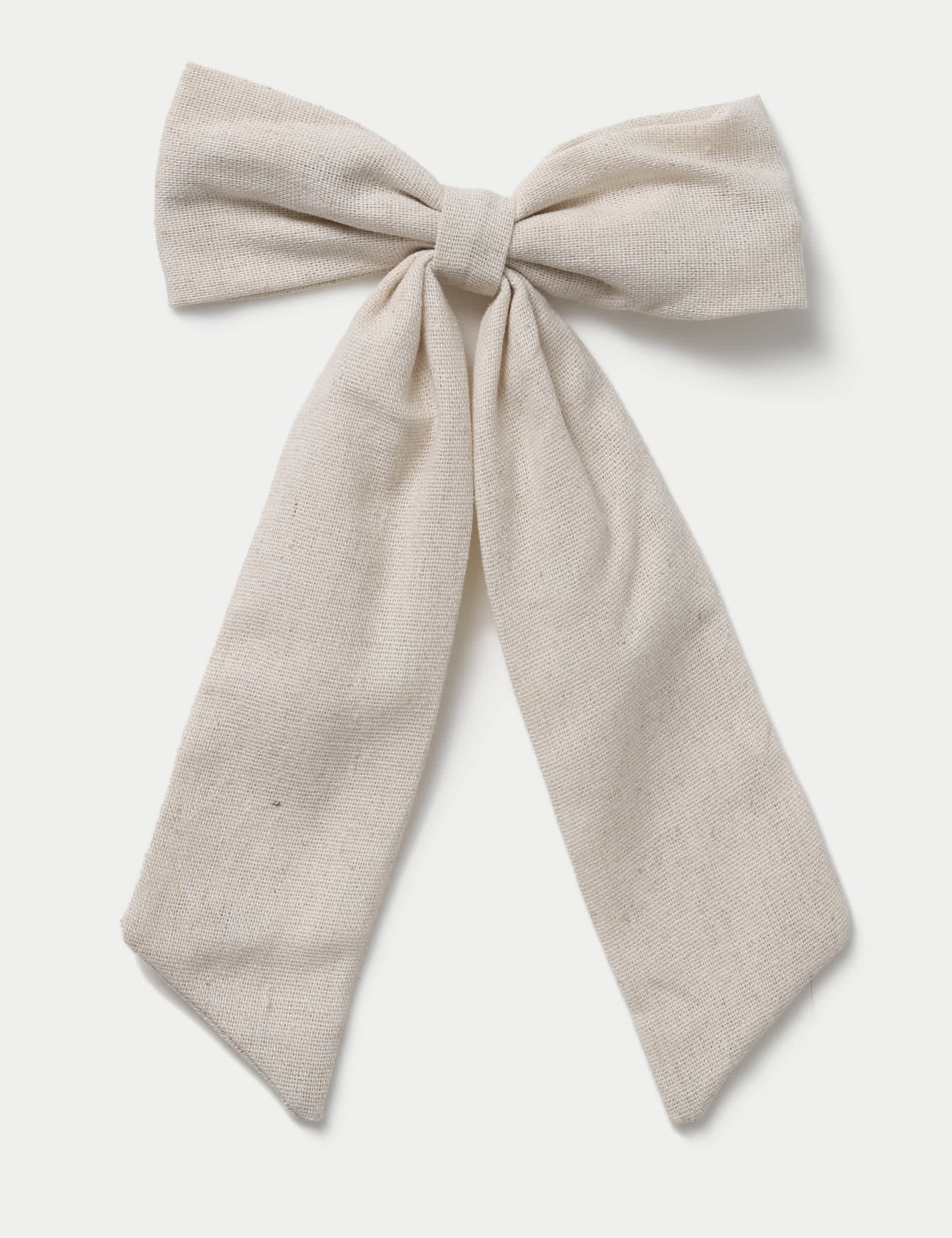 Beige linen bow hair accessory, imported from the UK