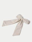 Beige linen bow hair accessory, imported from the UK