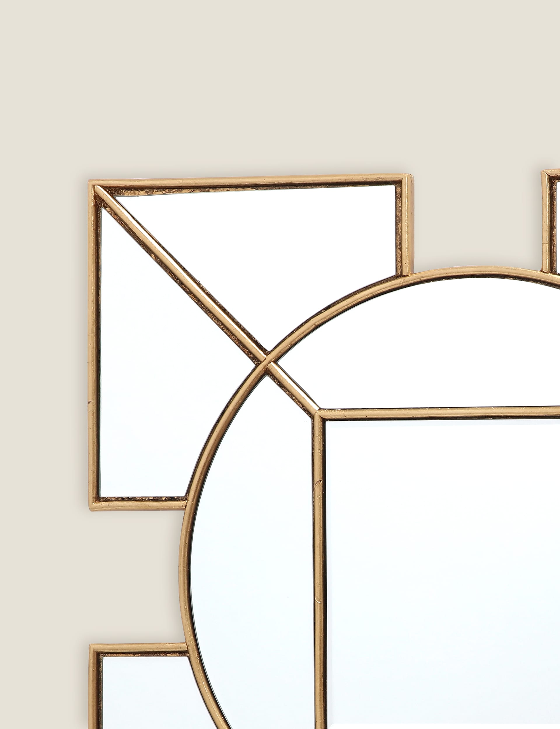 Lyshia Art Deco wall mirror with gold-tone finish, UK version