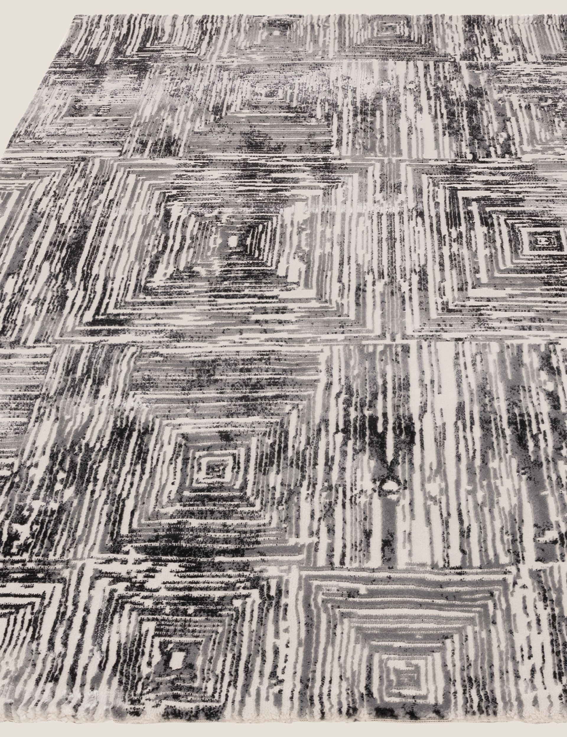 Asiatic Kuza Portrait woven rug, imported from the UK