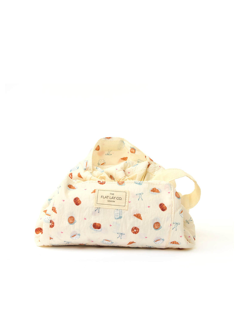 The Flat Lay Co Parachute Drawstring Patisserie makeup bag, UK version